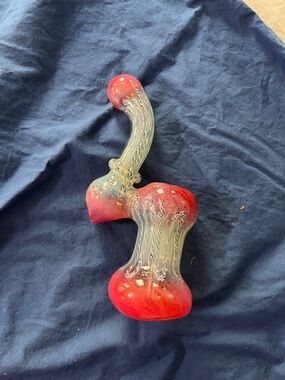 Hand-Blown bubbler with red and blue and white swirl accents